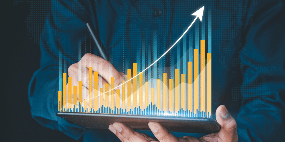 Businessperson with graph representing concept of rising interest rates