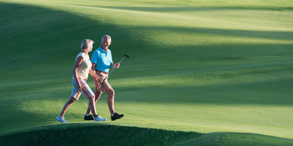 A retired couple enjoying one of Savannah's many beautiful golf courses