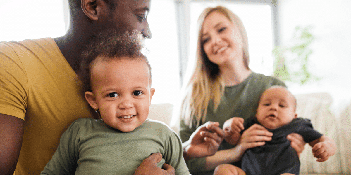 A young family of a married couple and their two children