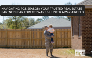 A smiling military family standing in front of a "Sold" sign outside their new home, symbolizing a successful PCS move. PCS season.
