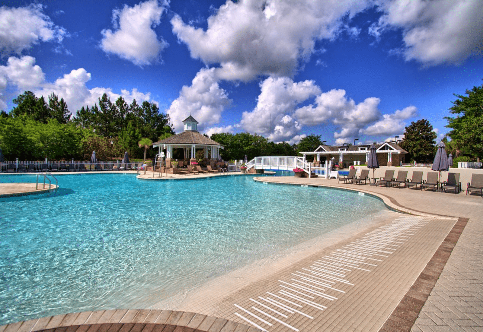 Resort style pool with lap lanes and splash area at Savannah Quarters Country Club in Westbrook